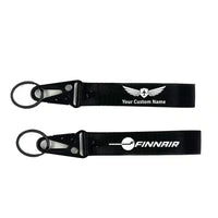 Thumbnail for Finnair Airlines aviation hawk-shaped key chain, durable metal alloy.