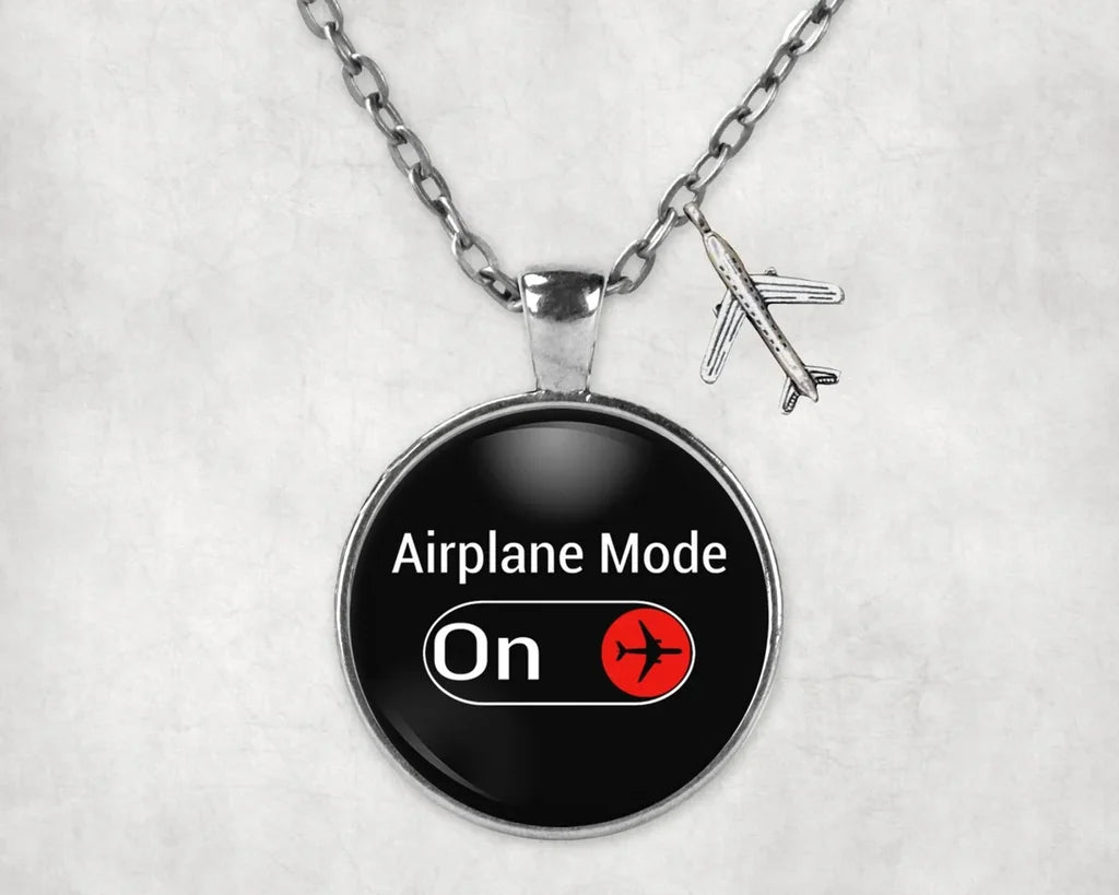 Airplane Mode On aviation-themed necklace, polished stainless steel.