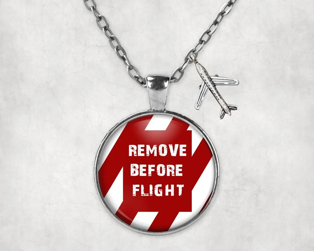 Special Edition Remove Before Flight aviation necklace, stainless steel body with engraved detail.