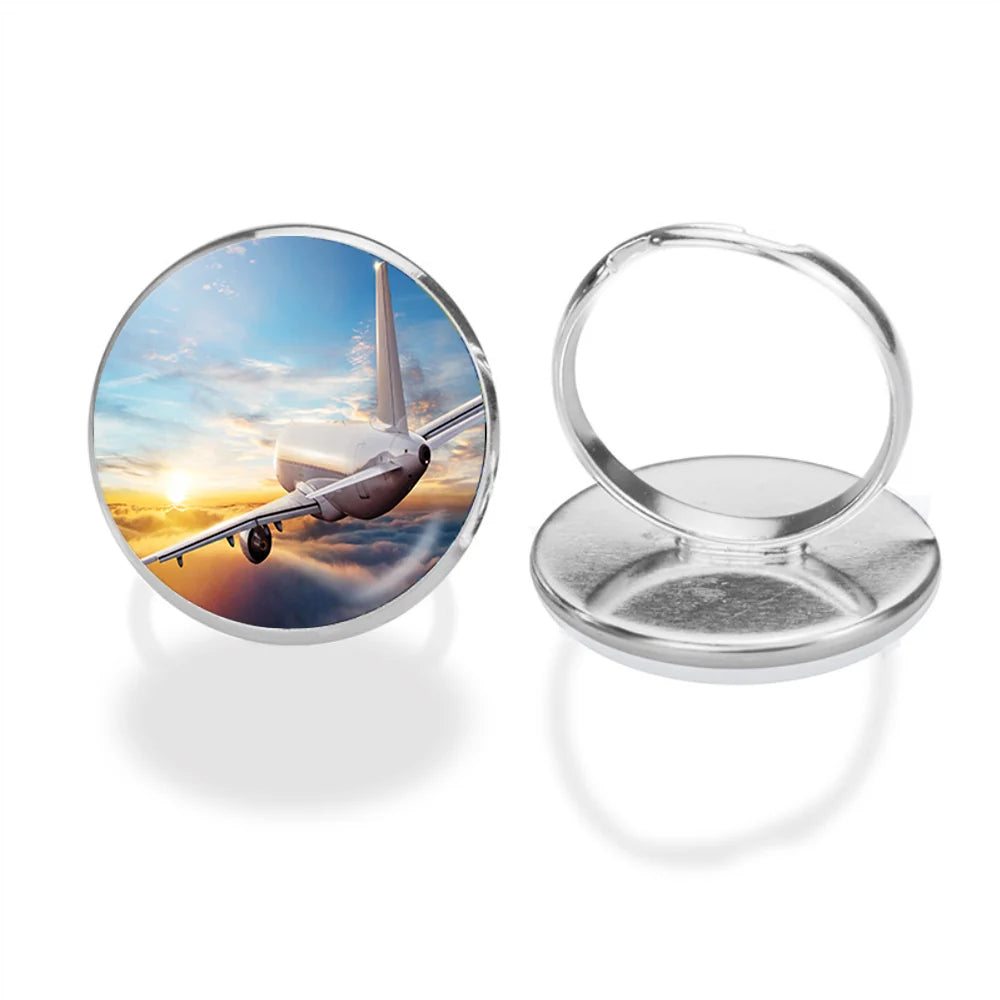 Airliner Jet Cruising over Clouds aviation ring in stainless steel.