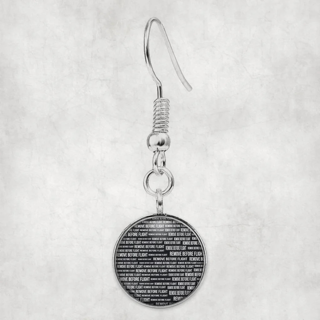 Remove Before Flight 3-Black aviation-themed earrings, polished hypoallergenic alloy.