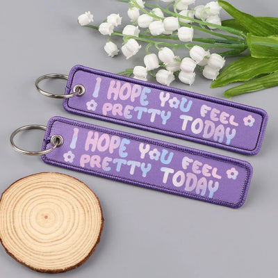I HOPE YOU FEEL PRETTY TODAY aviation fashion key chain in polished metal.