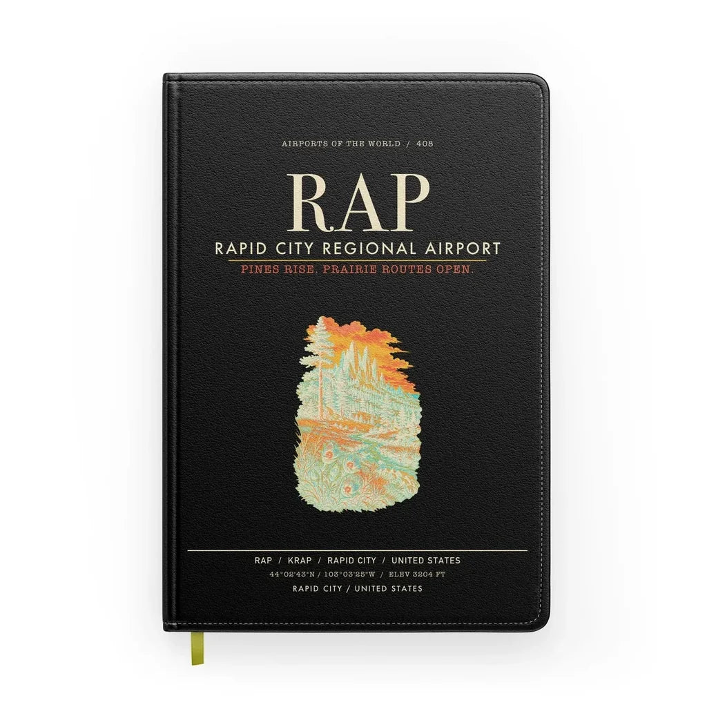 Rapid City Regional Airport (RAP) design on black notebook