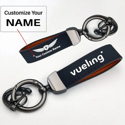 Side view of Vueling Airlines aviation horseshoe-buckle key chain in polished metal alloy, polished finish.