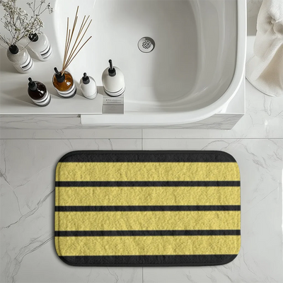 Pilot Epaulette aviation print bath mat, soft absorbent fabric with non-slip backing.
