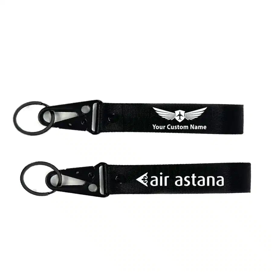 Air Astana aviation hawk-shaped key chain, durable metal alloy.