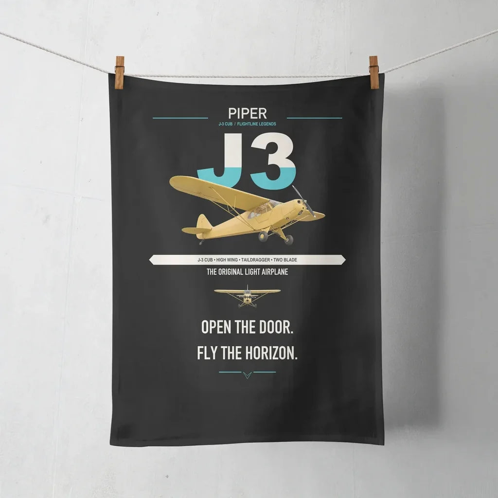 Piper J-3 Cub design on black towel