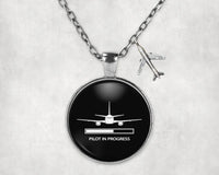 Thumbnail for Side view of Pilot In Progress aviation necklace in stainless steel, polished finish.