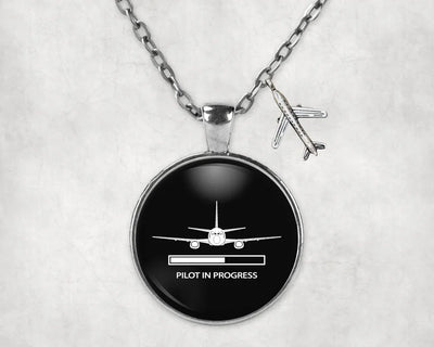 Side view of Pilot In Progress aviation necklace in stainless steel, polished finish.