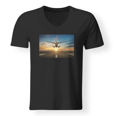 Airplane over Runway Towards the Sunrise aviation design printed on soft cotton V-neck T-shirt.