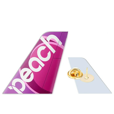 Peach Airlines aviation design tail-shape badge pin in polished alloy.