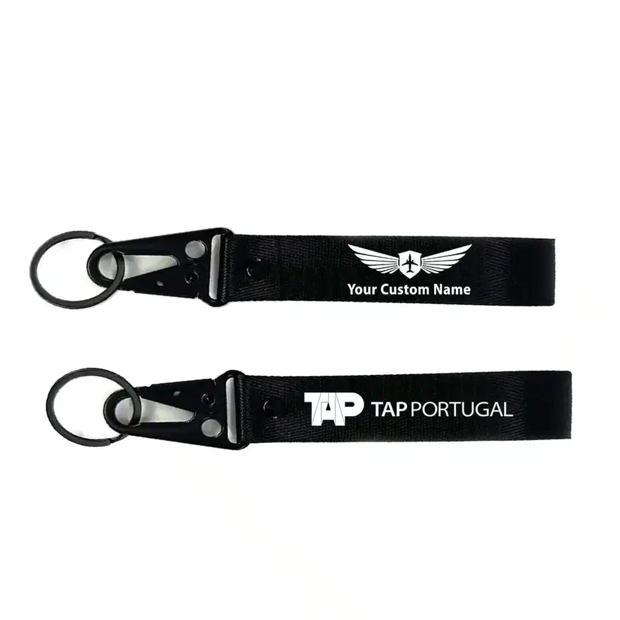 TAP Portugal Airlines aviation hawk-shaped key chain, durable metal alloy.