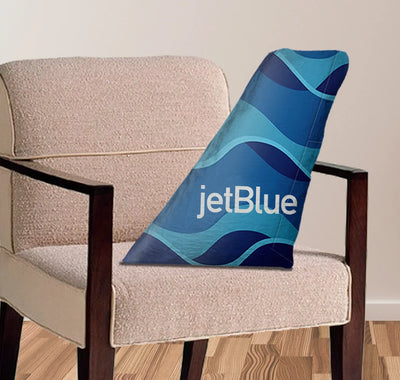 JetBlue Airlines aviation design on soft polyester filling aircraft tail pillow.