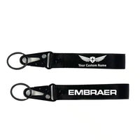 Thumbnail for Embraer & Text aviation hawk-shaped key chain, durable metal alloy.