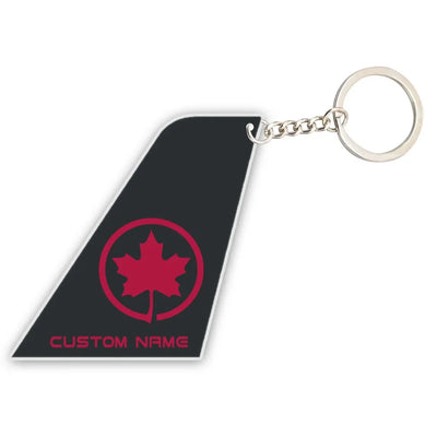 Air Canada aviation shaped key chain, durable metal alloy.