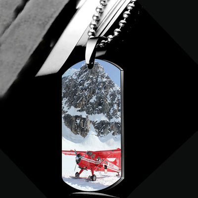 Amazing Snow Airplane aviation necklace, polished metal body with engraved detail.