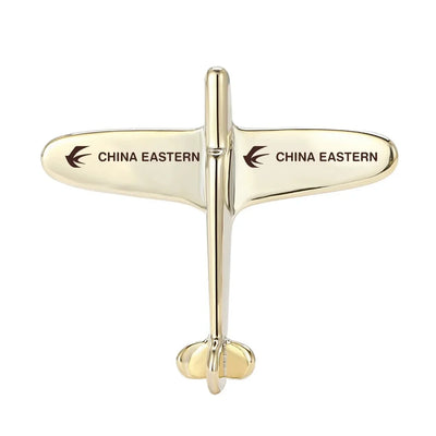 Side view of China Eastern Airlines Airplane Shape aviation airplane-shape brooch in polished alloy, polished finish.