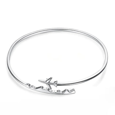 Side view of %100 Genuine 925 Sterling Silver Airplane aviation bracelet in polished metal, polished finish.