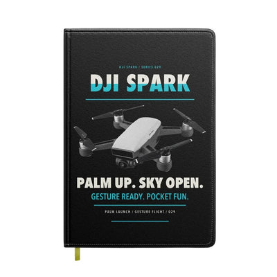 DJI Spark design on black notebook