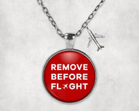 Thumbnail for Remove Before Flight aviation-themed necklace, polished stainless steel.