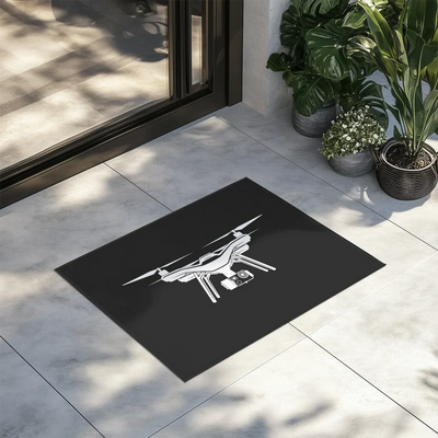 Drone Silhouette aviation design on durable fibre with non-slip backing door mat.
