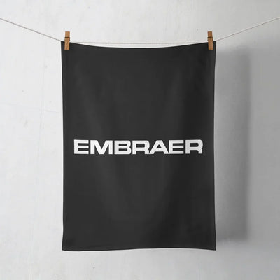 Embraer & Text aviation design on soft absorbent cotton towel.