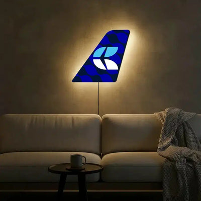 CommuteAir aviation design on durable metal with LED aircraft tail wall art.