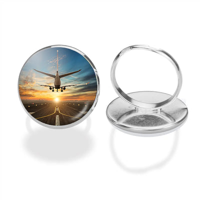 Airplane over Runway Towards the Sunrise aviation ring in stainless steel.