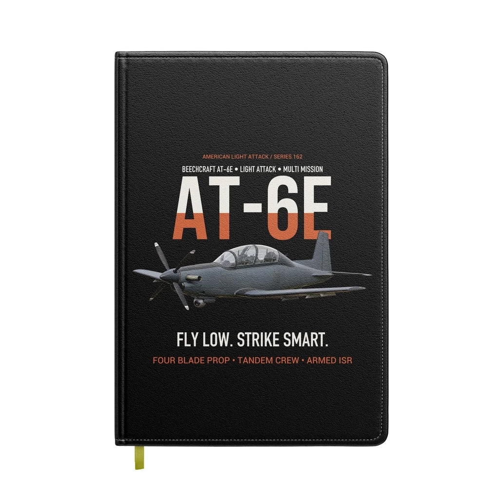 AT-6E Wolverine Light Attack design on black notebook