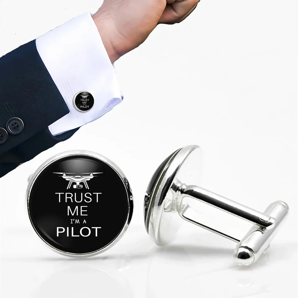 Trust Me I'm a Pilot (Drone) aviation cuff links, polished metal body with engraved detail.