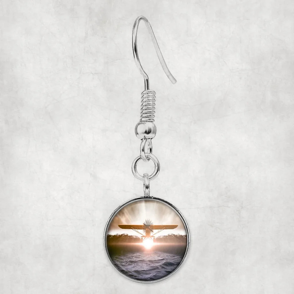 Side view of Graphical Propeller aviation earrings in hypoallergenic alloy, polished finish.