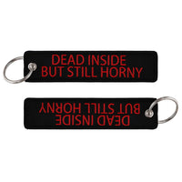 Thumbnail for DEAD INSIDE BUT STILL HORNY aviation fashion key chain in polished metal.