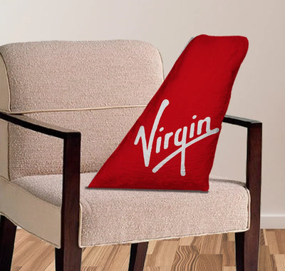 Virgin Atlantic aviation design on soft polyester filling aircraft tail pillow.