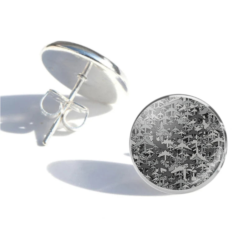 Dark Coloured Airplanes aviation-themed stud earrings, polished stainless steel.