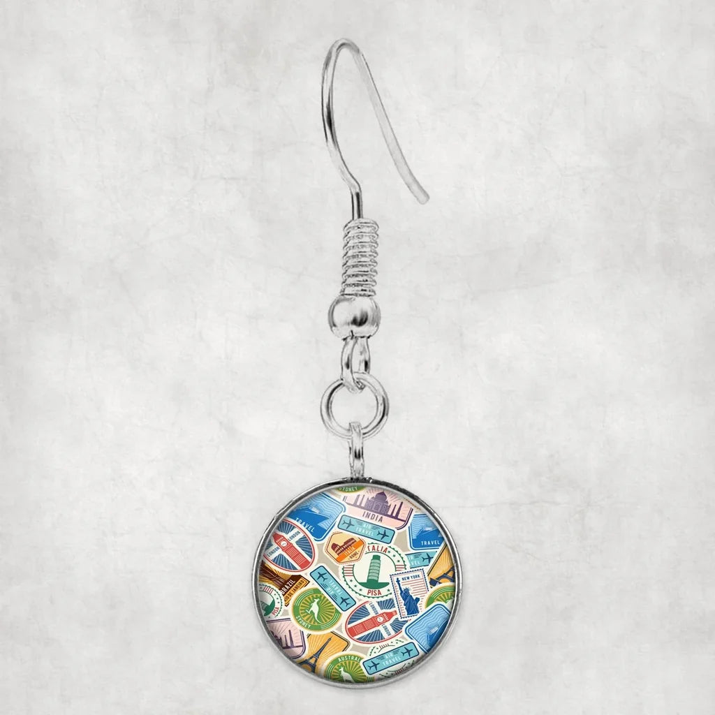 Travel Stickers aviation-themed earrings, polished hypoallergenic alloy.