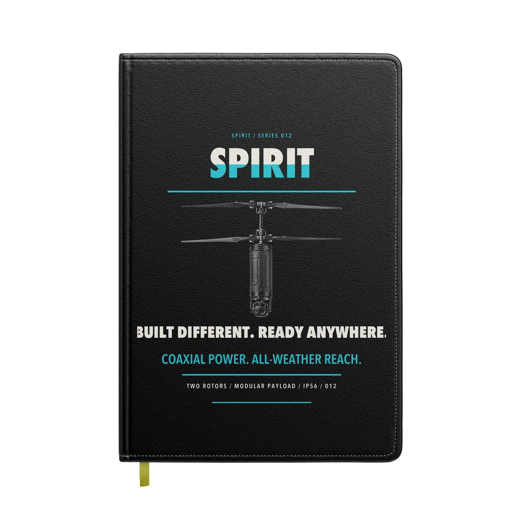 Ascent AeroSystems Spirit design on black notebook