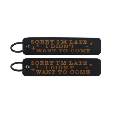 SORRY I’M LATE I DIDN’T WANT TO COME aviation fashion key chain in polished metal.