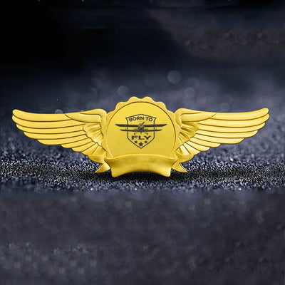 Born To Fly aviation badge in polished metal.