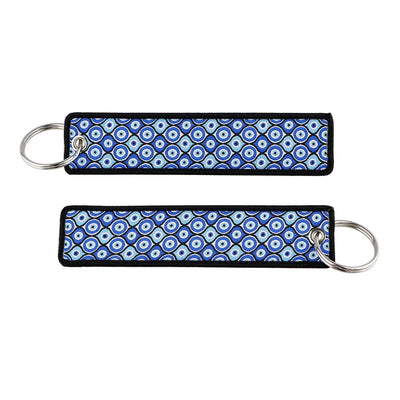Blue Evil Eye Guardian aviation fashion key chain in polished metal.