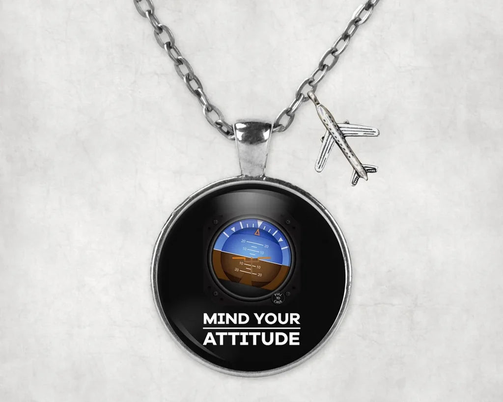 Mind Your Attitude aviation necklace, stainless steel body with engraved detail.