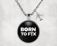 Thumbnail for Side view of Born To Fix Airplanes aviation necklace in stainless steel, polished finish.