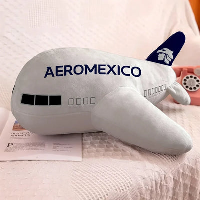 Aero Mexico aviation design on soft polyester filling airplane-shape decorative pillow.