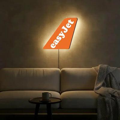 Easy jet aviation design on durable metal with LED aircraft tail wall art.