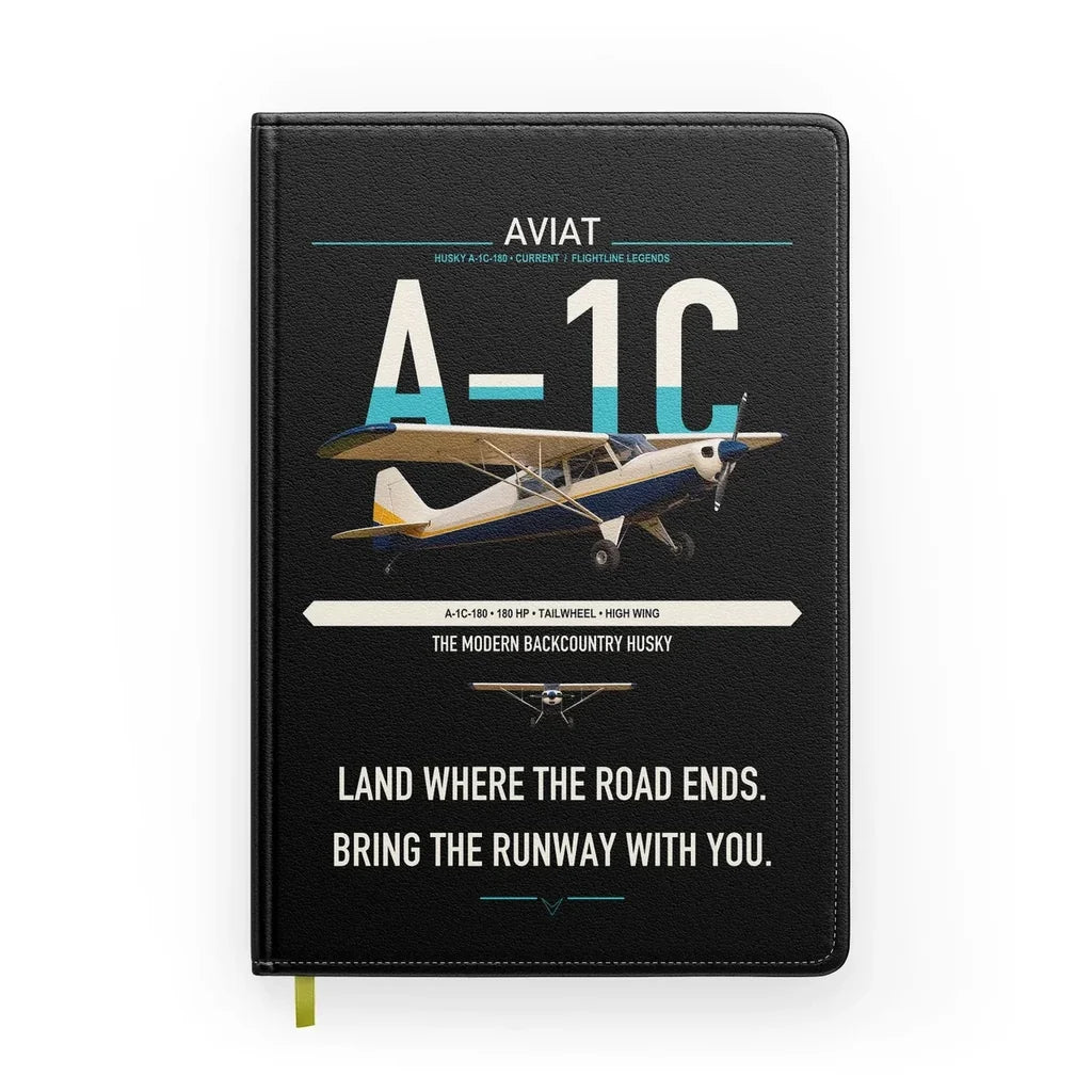 Aviat Husky A-1C-180 design on black notebook
