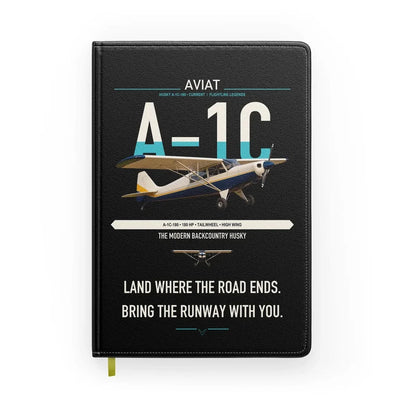 Aviat Husky A-1C-180 design on black notebook