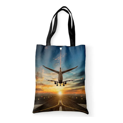 Airplane over Runway Towards the Sunrise aviation design tote bag, canvas construction.