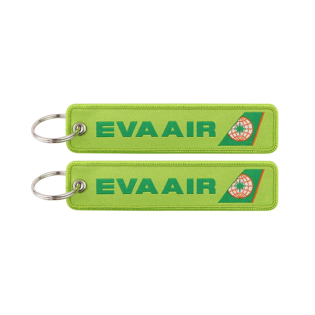 EVA Air Airlines (Green) aviation Remove Before Flight key chain, aviation-tag style webbing.