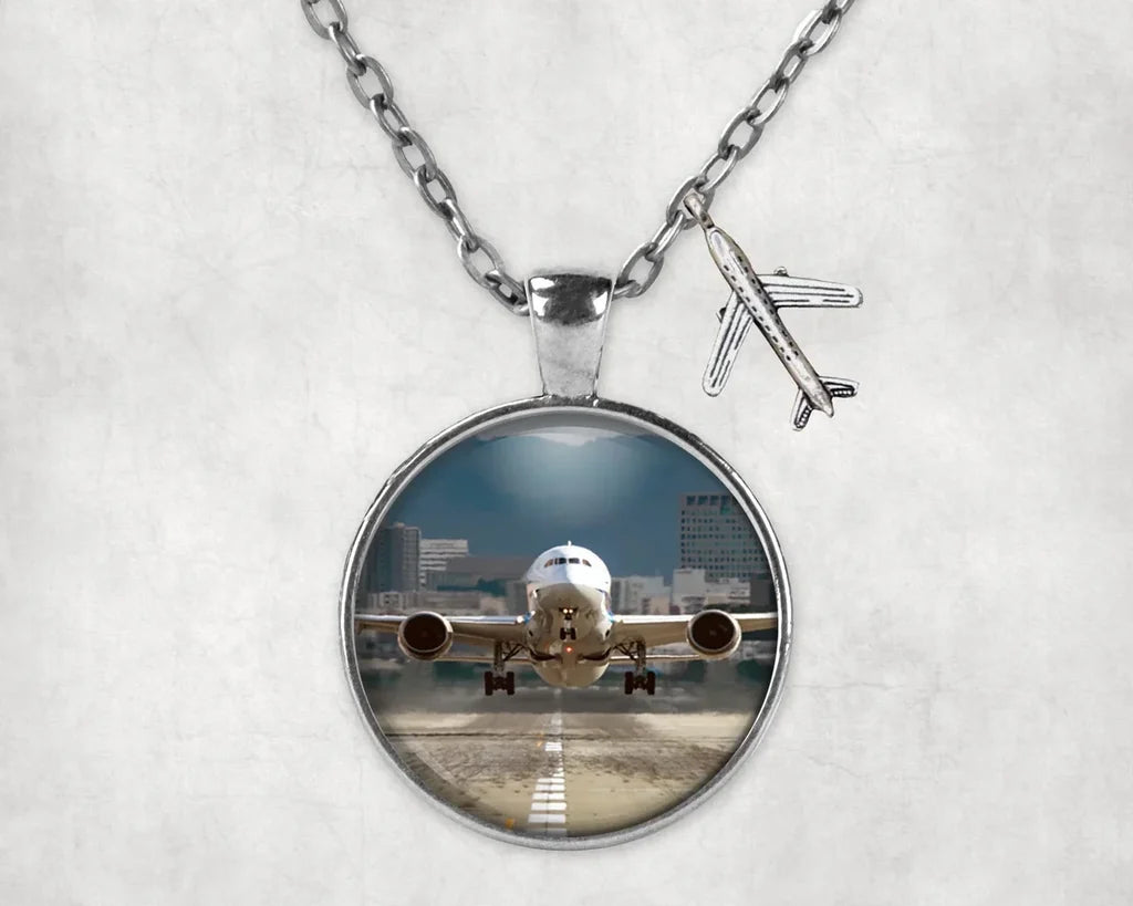 Departing Boeing 787 Dreamliner aviation necklace, stainless steel body with engraved detail.