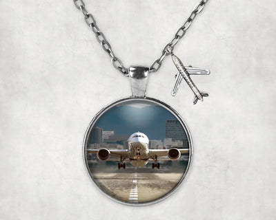 Departing Boeing 787 Dreamliner aviation necklace, stainless steel body with engraved detail.