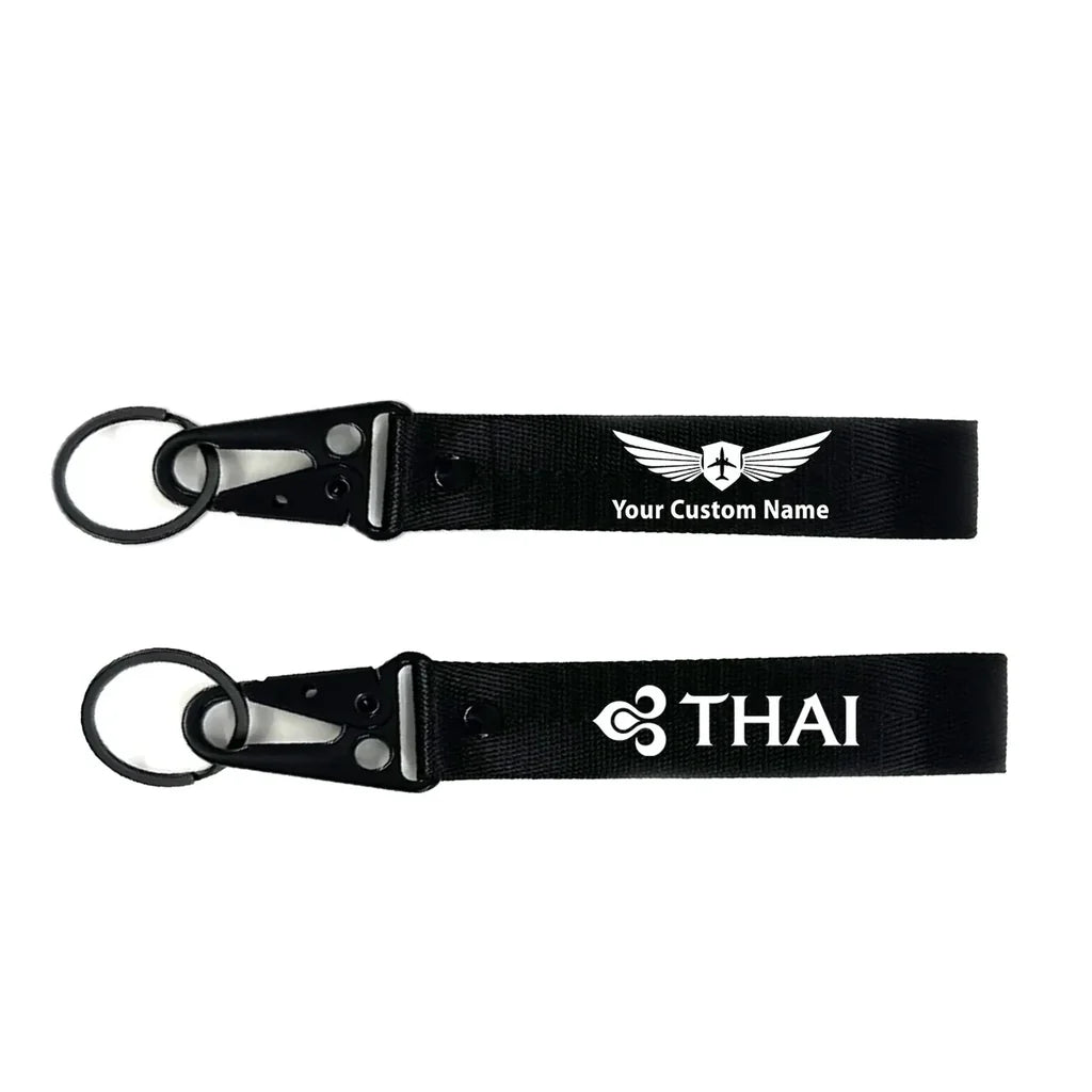 Thai Airways aviation hawk-shaped key chain, durable metal alloy.